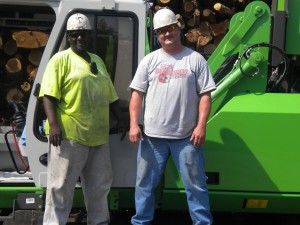 Mill Manager, Chad Cowart (right) with Willie Holt, Operator, with their new  830 R machine.
