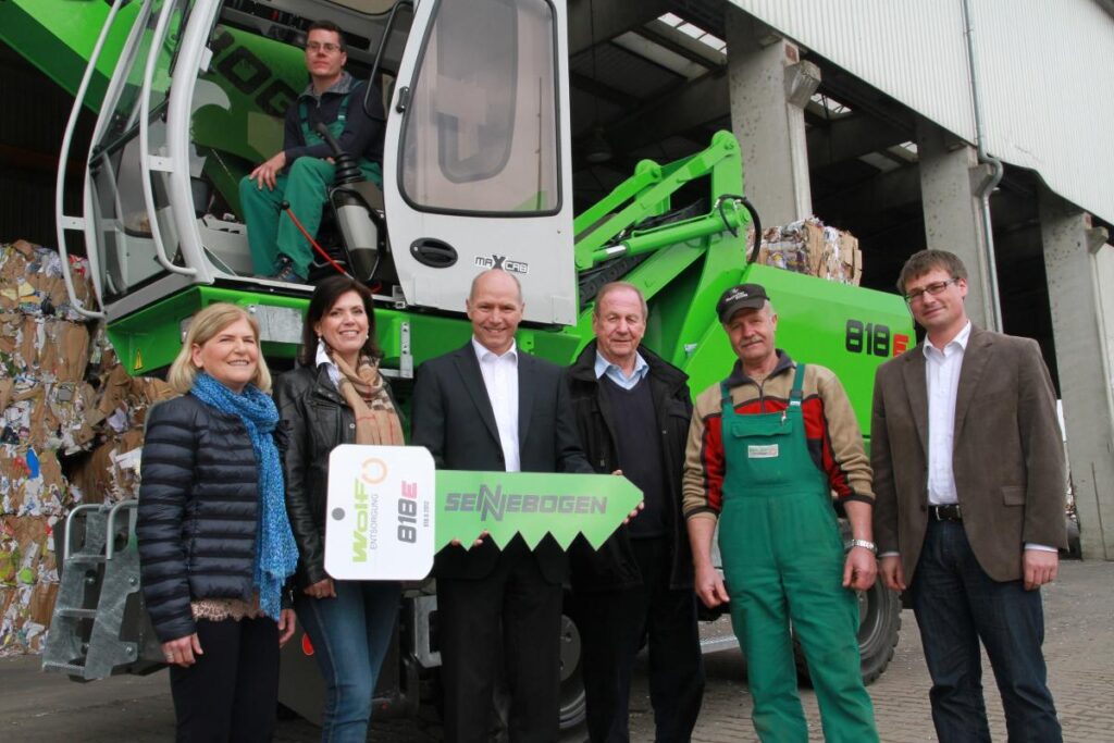 SENNEBOGEN CEO Erich Sennebogen came by the Wolf facility personally to hand over the keys the new 818 M E-Series waste handler.