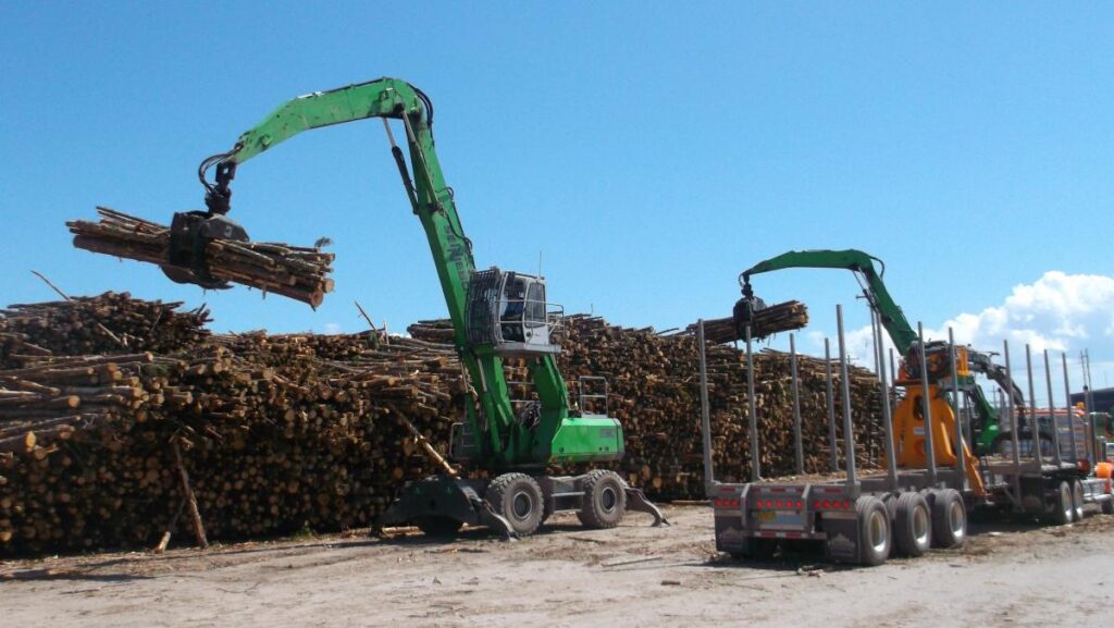 Trucks get unloaded in double quick time while the front and rear stacks get higher and higher.