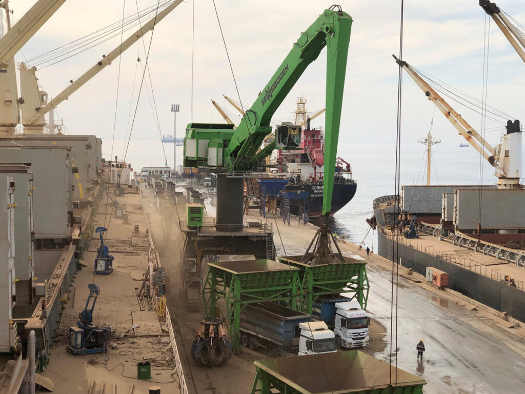 Gentle giant: the sensitive and precise control of the 13 cu. yd. grab being used to safely and efficiently load trucks.