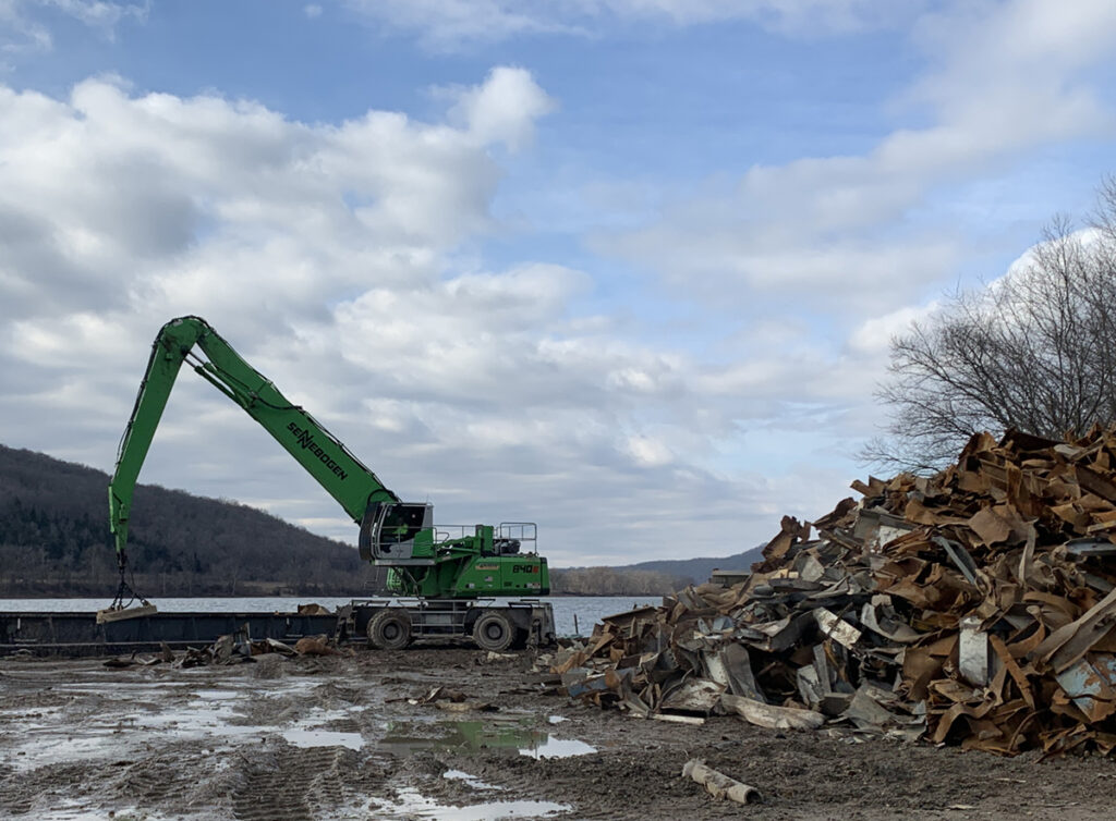 The laydown area collected up the material and when ready, it all gets loaded on the barge