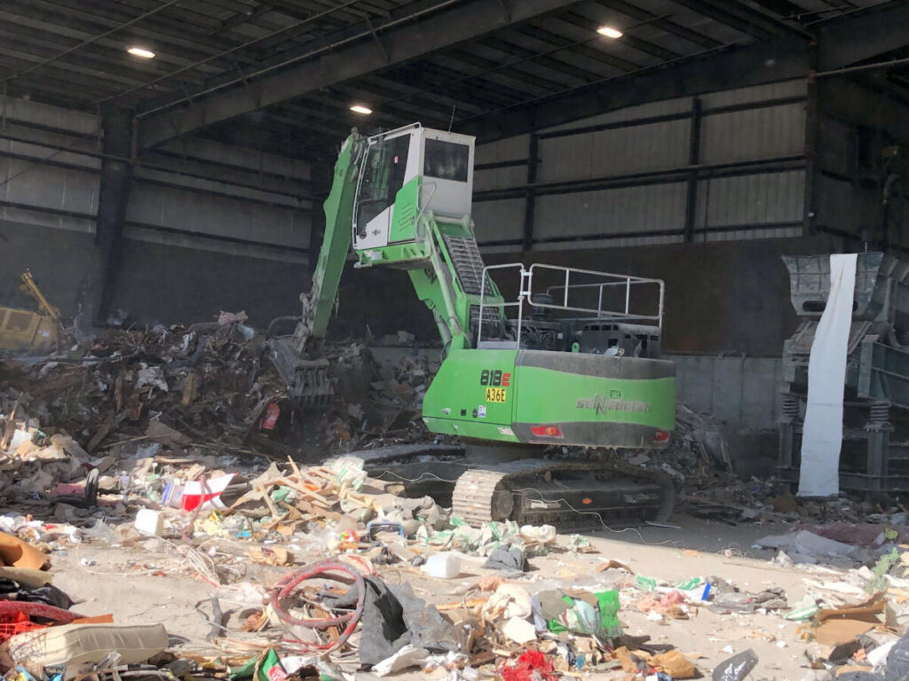 Comfortable Maxcab with A/C keeps operator safe from the harsh environment.